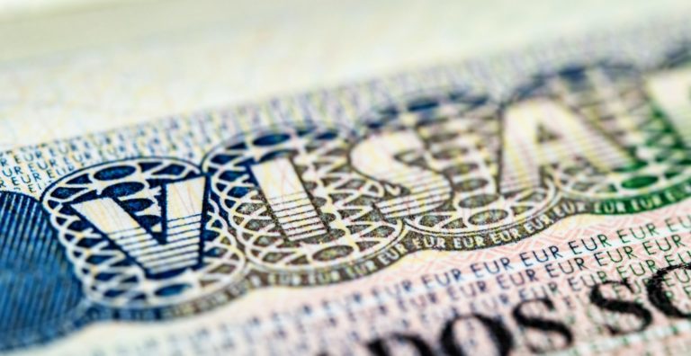 Internationa visa in passport close up view.